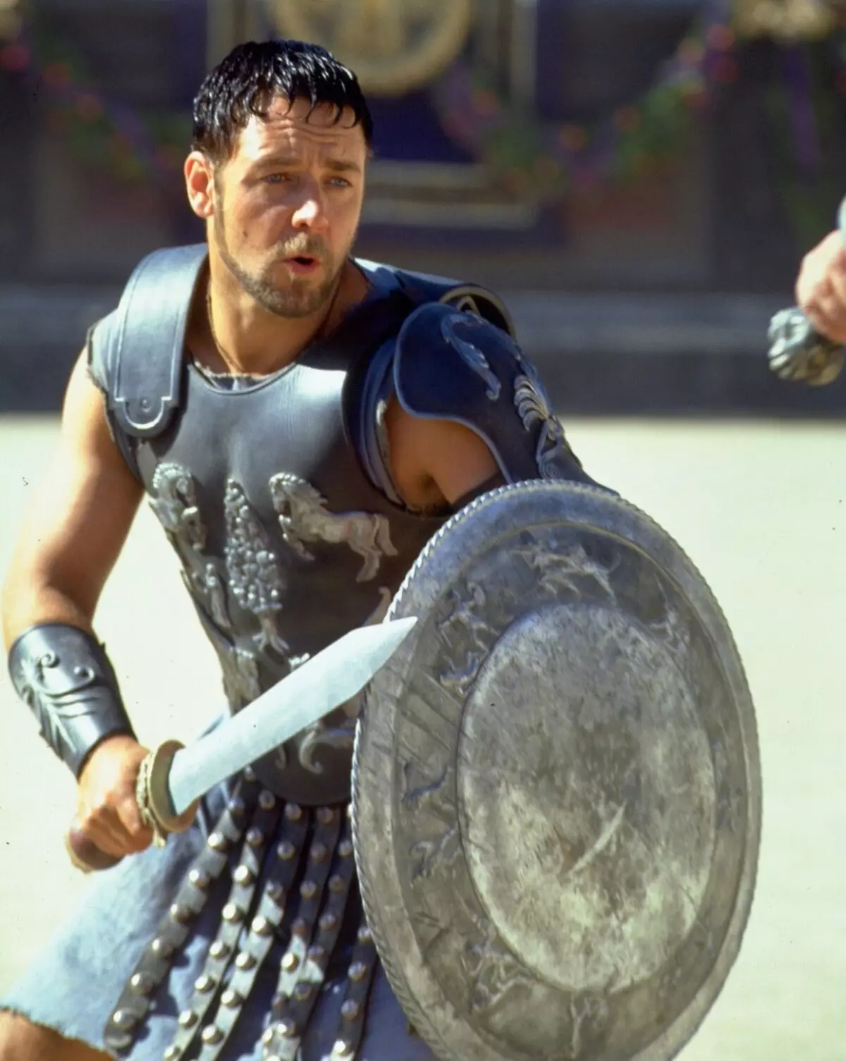 Russell Crowe, gladiatorun orijinal ssenarisinin dəhşətli olduğunu etiraf etdi 105941_1