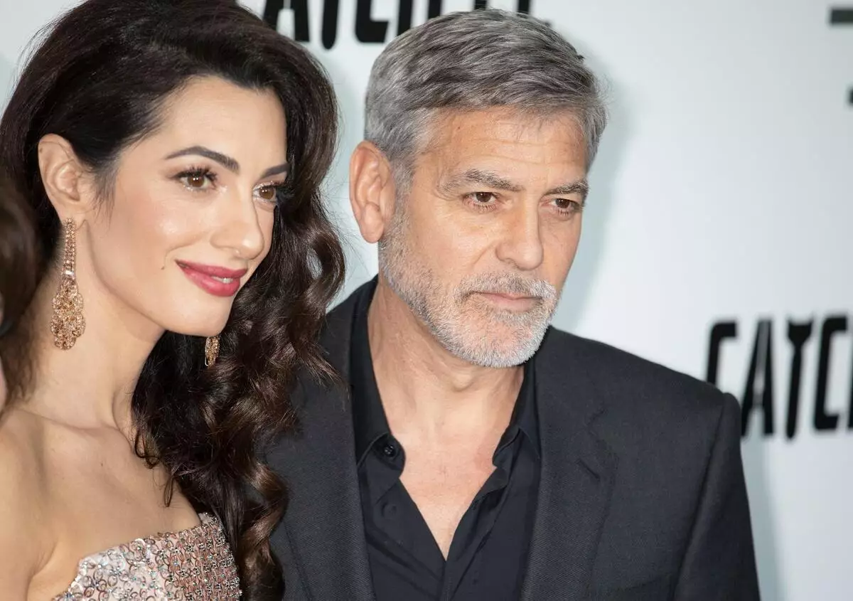 UGeorge Clooney ukhulume ngokusabela okujabulisayo ekukhulelweni kwe-Amal Gemini: 