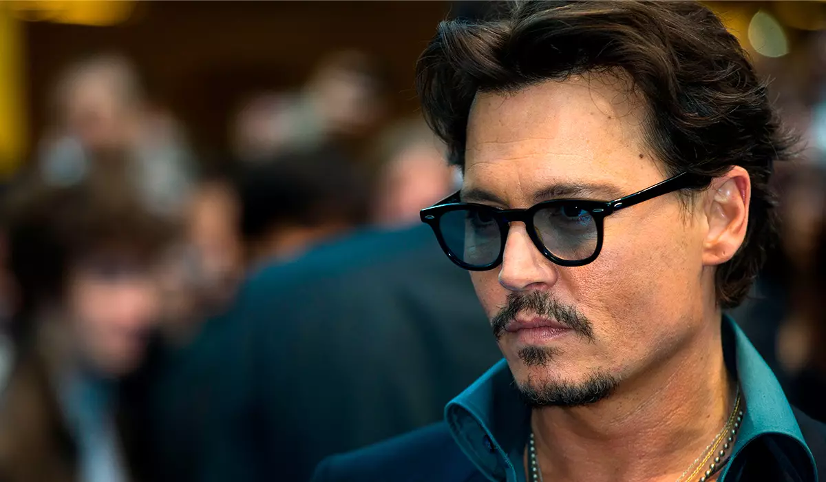 Amber Hiert Lëpsen: Johnny Depp verluer viru Geriicht géint den Tabloid