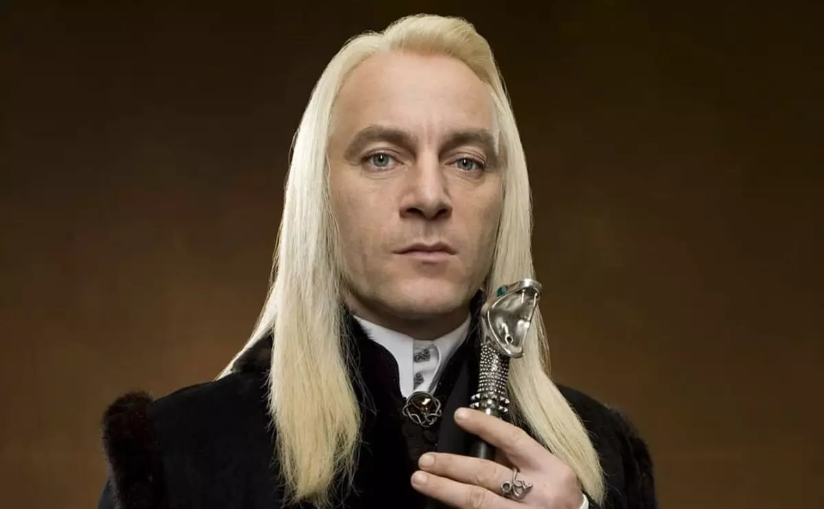 Jason Isares from Harry Potter addressed to fans with Lucius Malfoy wand