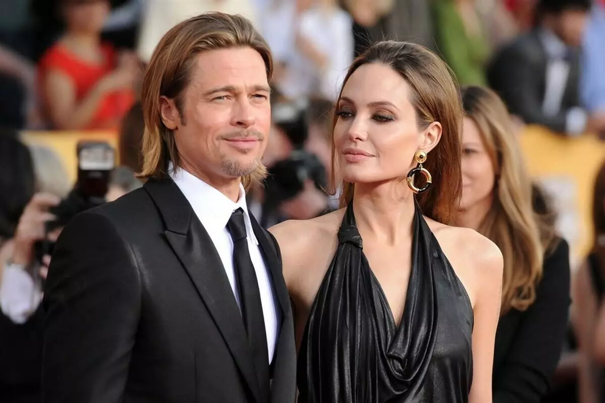 The godfather Angelina Jolie commented on a litt trial with Brad Pitt