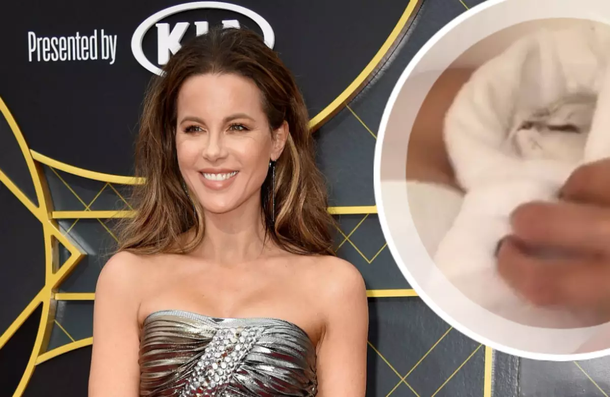 Como mãe com uma criança: no dia dos gatos Kate Beckinsale lavou o gato, como um bebê