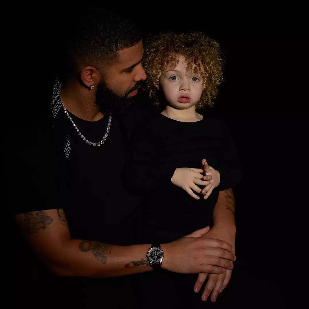 Blue-eyed Angel: Drake first showed a two-year-old son