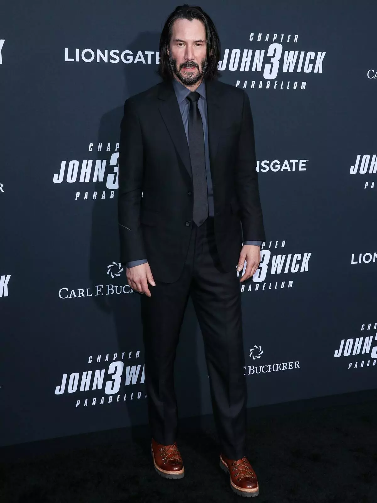 Grianghraf: Keanu Reeves agus Berry Holly ag taibhiú an scannáin 