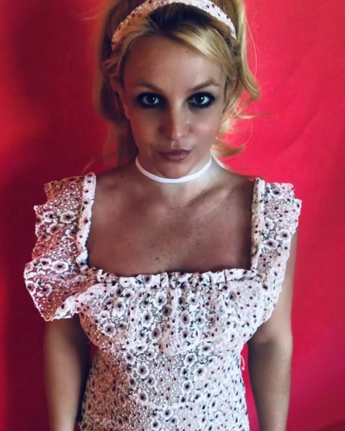 Britney Spears suaite lucht leanúna le grianghraif mímhacánta 